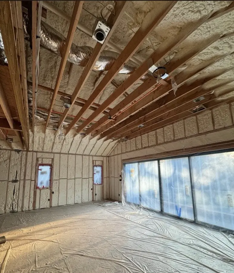 Interior walls and ceiling insulated with spray foam during new construction in Deer Park
